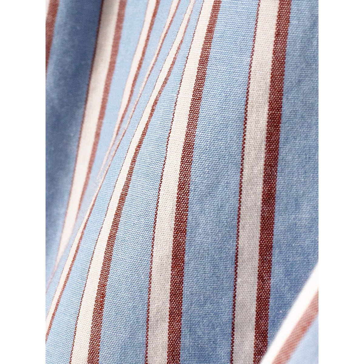 Close-up texture view of the light blue, rust brown, and white vertical striped fabric on the Alto Pant.