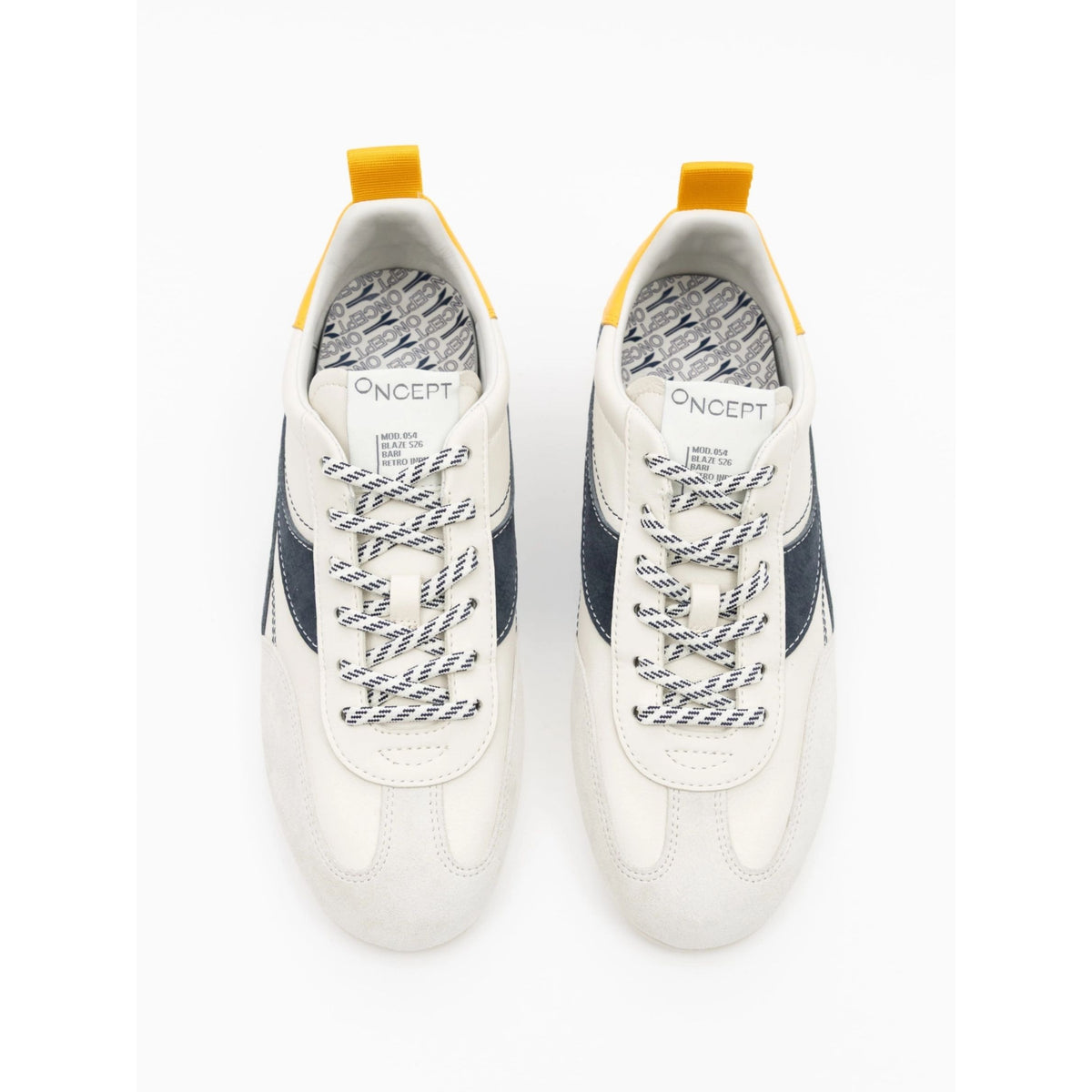 A pair of Oncept low-top sneakers shown from a top-down view. The sneakers are primarily off-white with navy blue side stripes, patterned gray-and-white laces, and bright yellow heel pull tabs.
