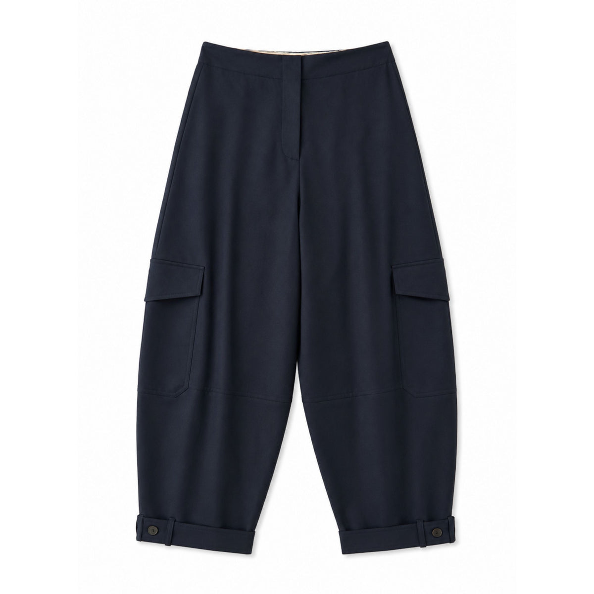 A pair of dark navy blue cargo pants with a relaxed, baggy fit, featuring side cargo pockets and buttoned cuffs, displayed flat against a plain white background.