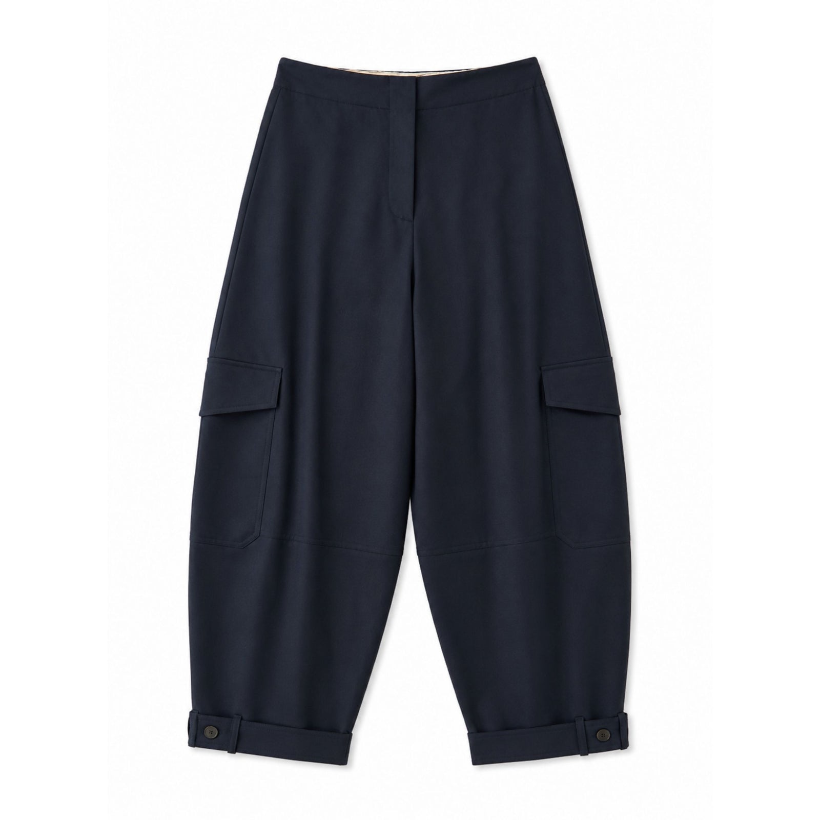 A pair of dark navy blue cargo pants with a relaxed, baggy fit, featuring side cargo pockets and buttoned cuffs, displayed flat against a plain white background.