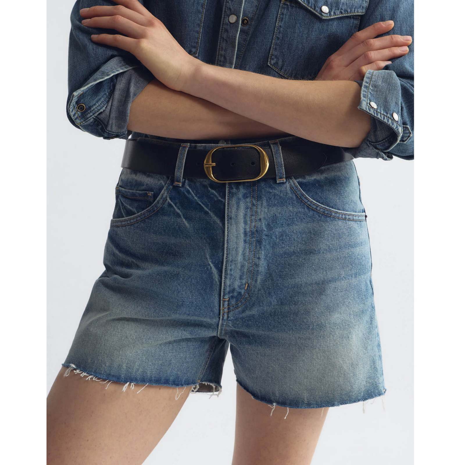 Blue denim short on a white background