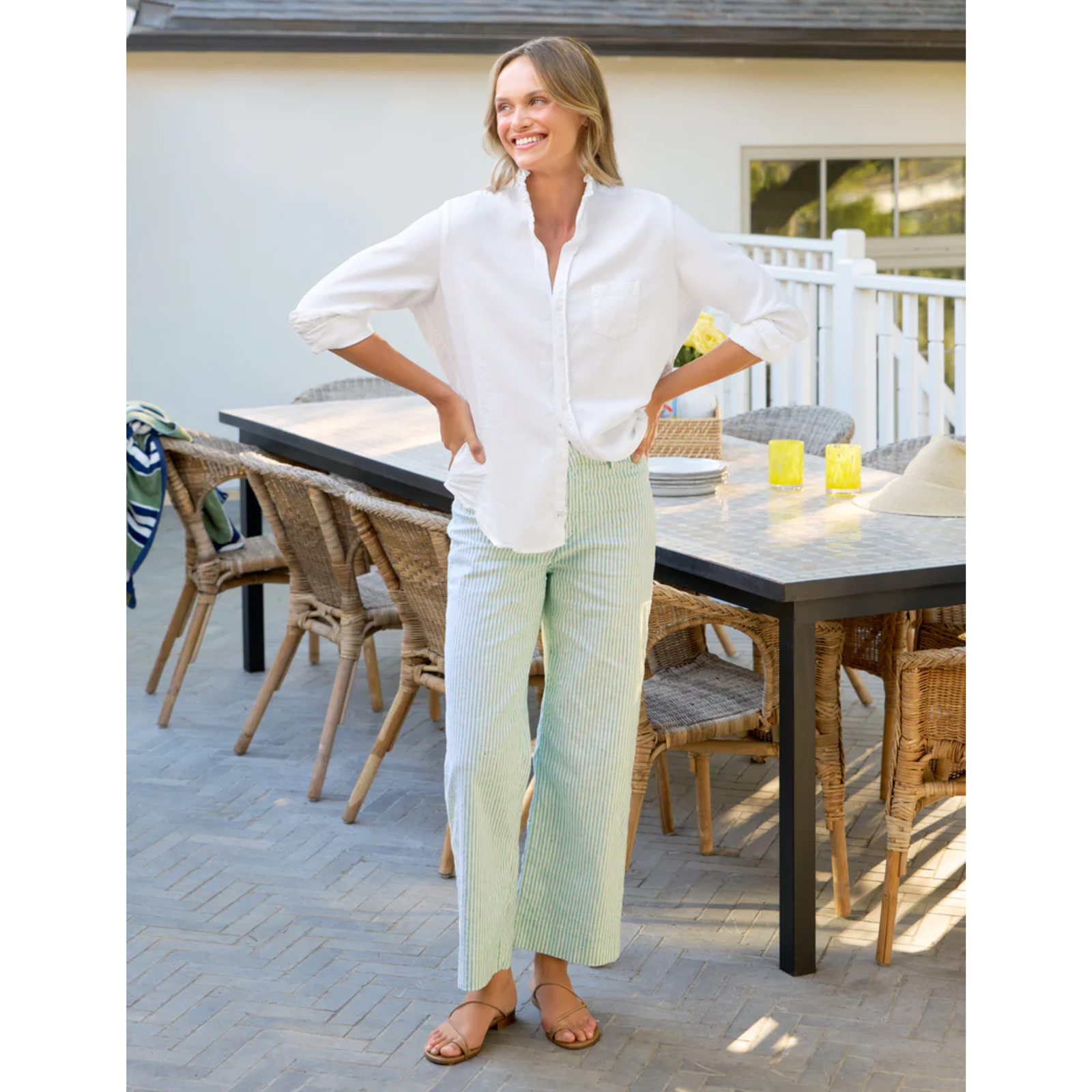 White shirt with rolled-up sleeves on a white background, featuring the brand 'Frank & Eileen'.