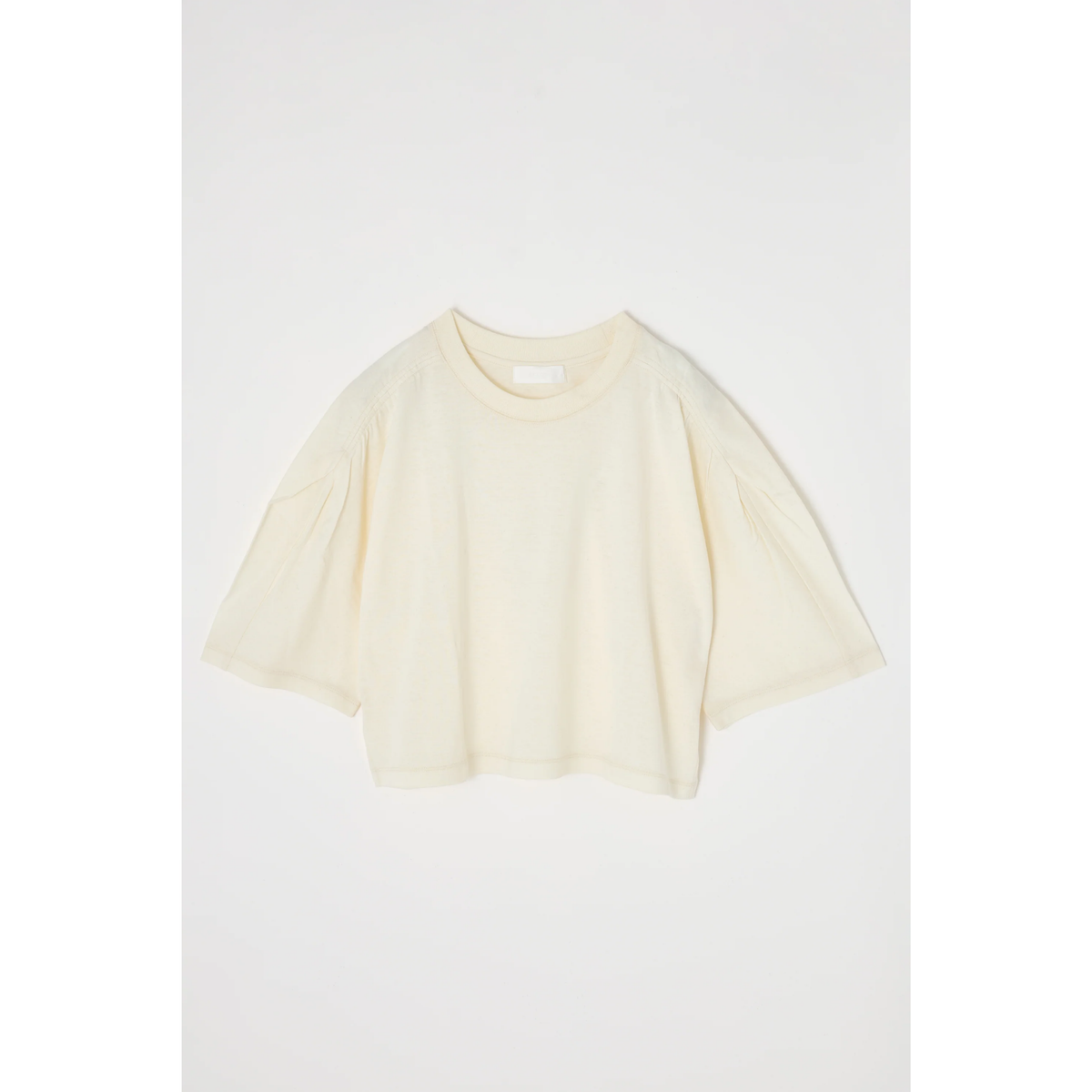 Light yellow top on a white background