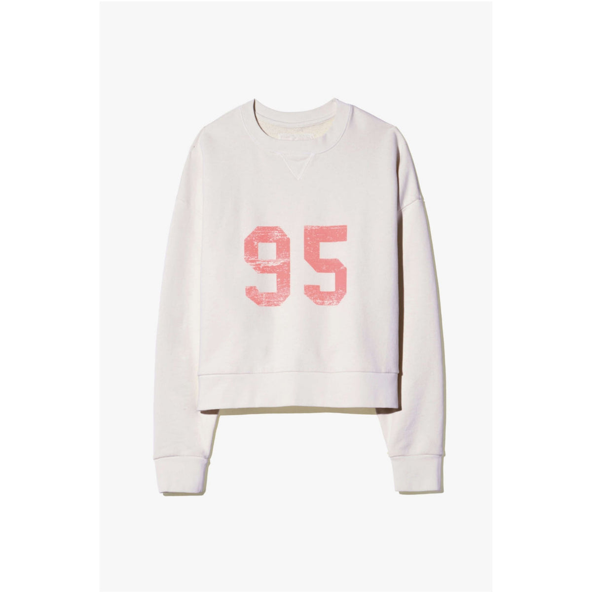 A light beige crewneck sweatshirt featuring a distressed pink '95' graphic on the front, displayed against a clean white background.