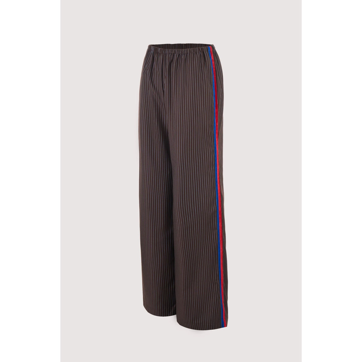 A pair of dark brown wide-leg trousers with thin vertical pinstripes and a red and blue stripe down the side, shown against a light gray background.
