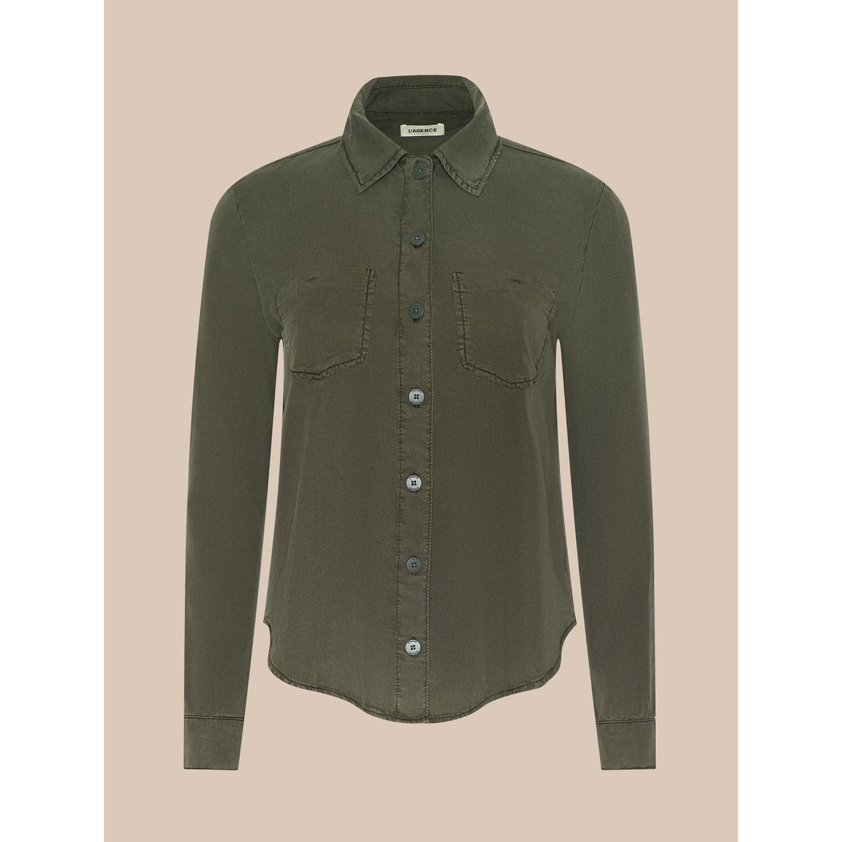 An olive green long-sleeve button-up shirt with two chest pockets, displayed on a solid beige background.