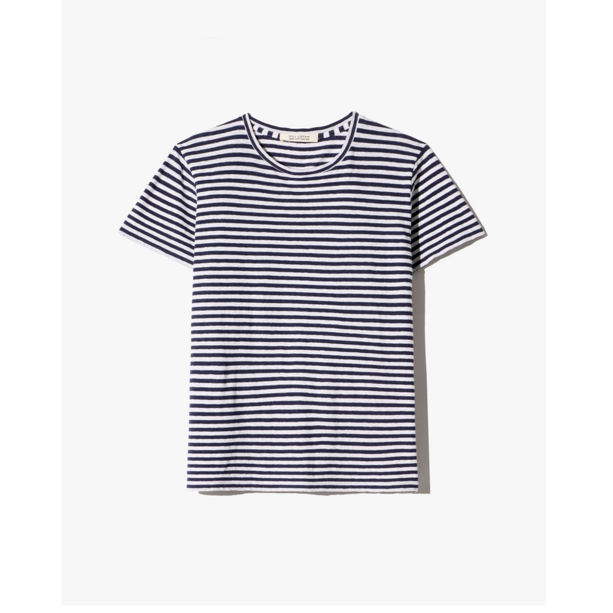 Navy and white striped t-shirt on a light gray background