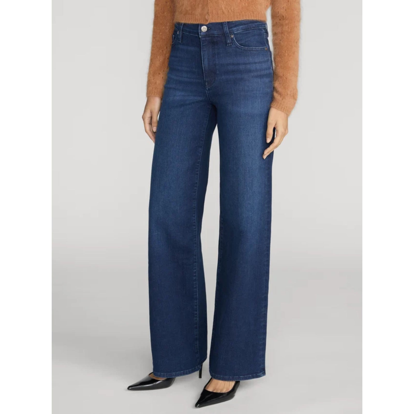 A pair of dark blue wide-leg jeans shown flat against a light gray background.