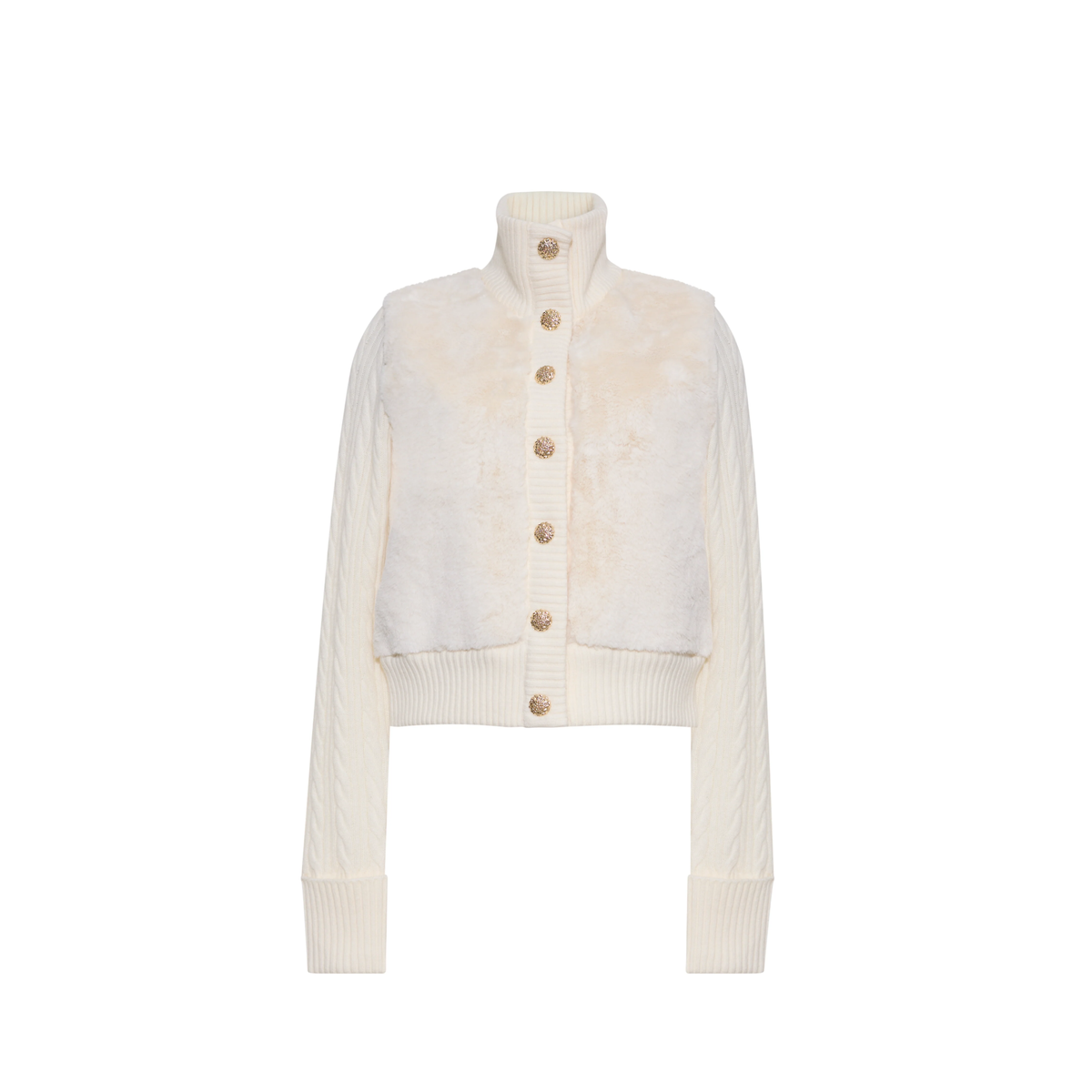 An off-white cropped cardigan featuring a textured faux-fur front panel with a subtle warm tan patch, a ribbed mock neck, button closure, and ribbed cuffs and hem.
