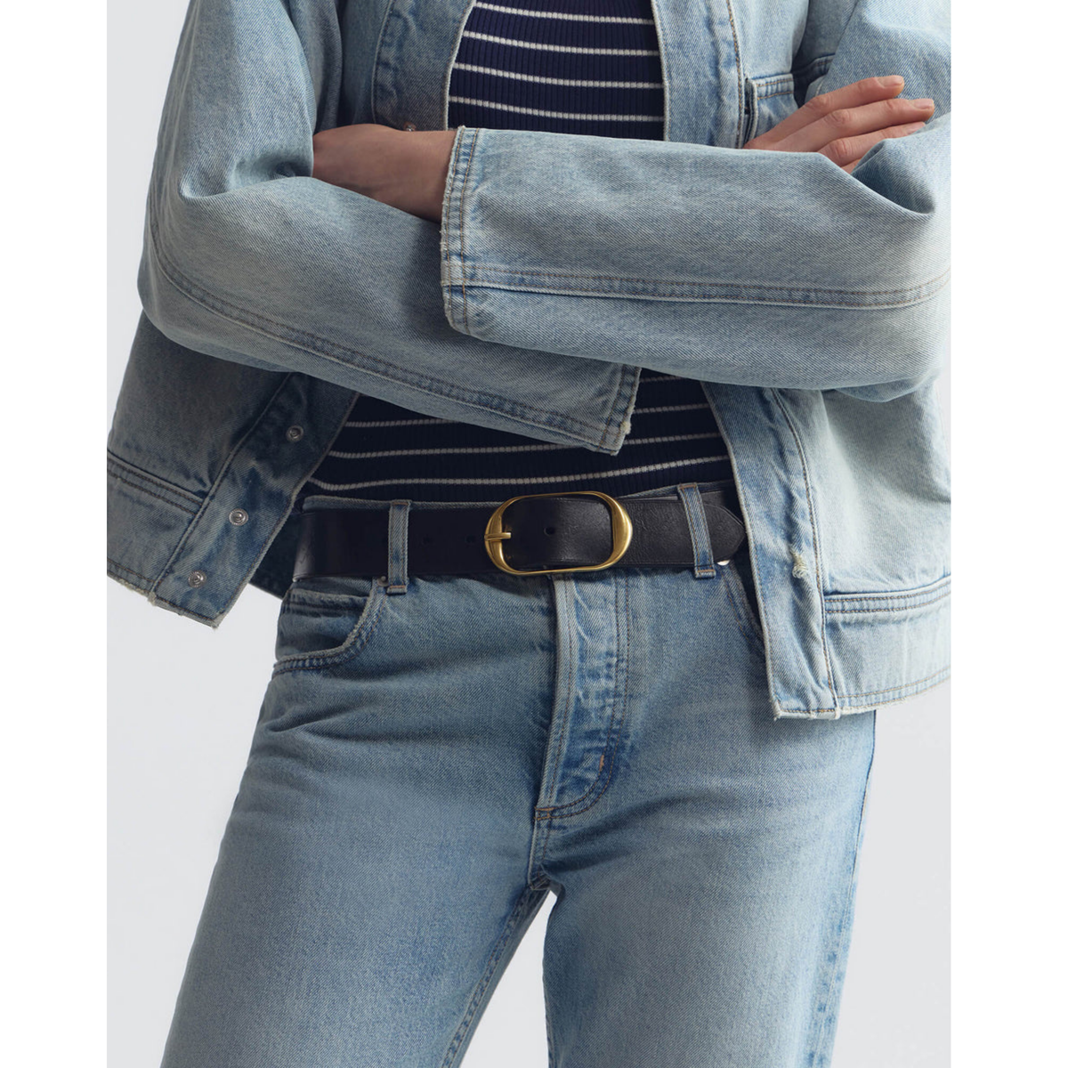 Blue denim pants on a white background