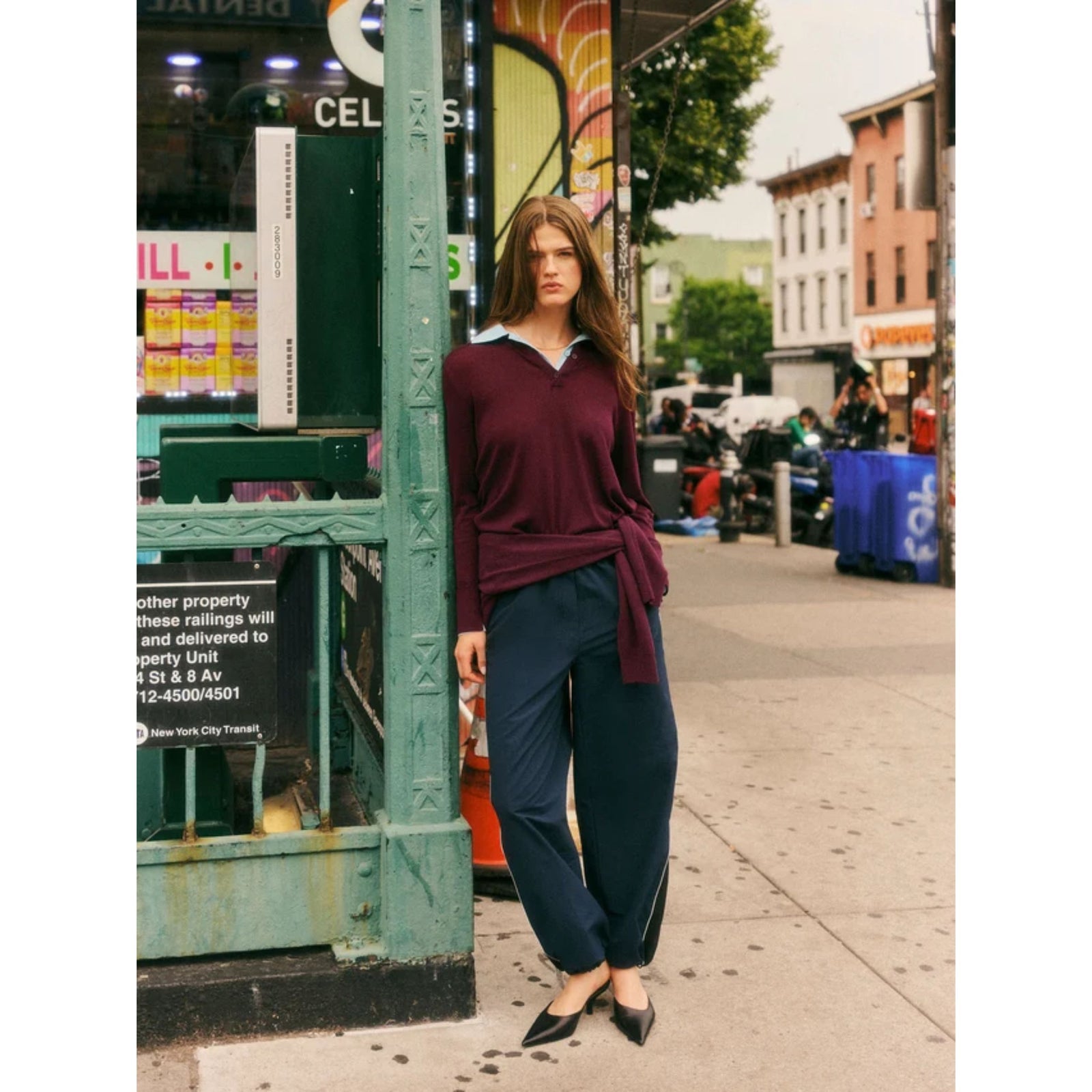 Front flat lay view of the "Merino Layered Polo" in burgundy, featuring long sleeves, a open v-neck placket, and a contrasting light blue collar against a plain background.