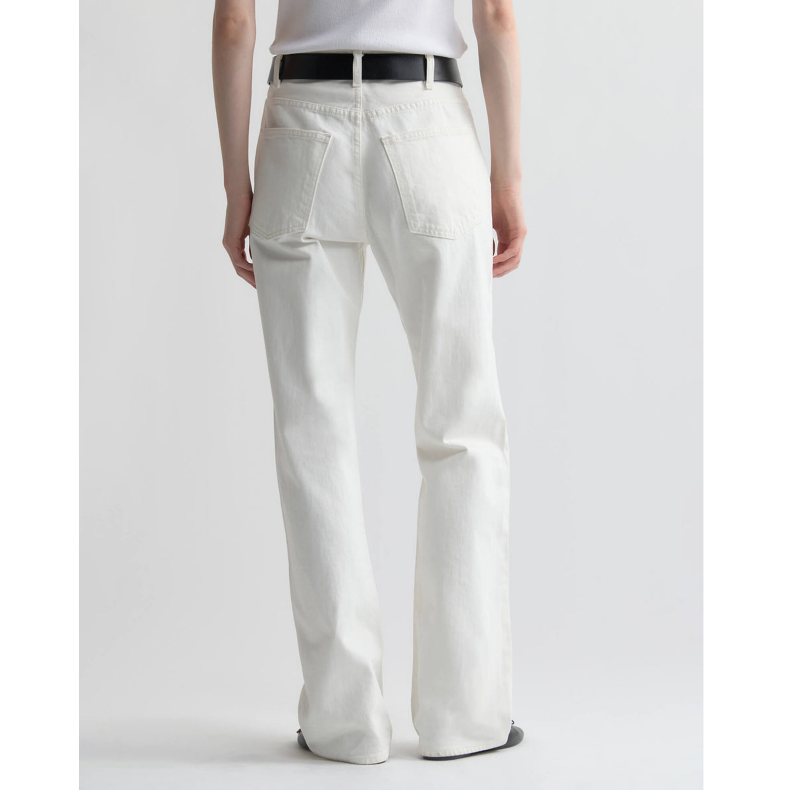 White wide-leg jeans on a light gray background