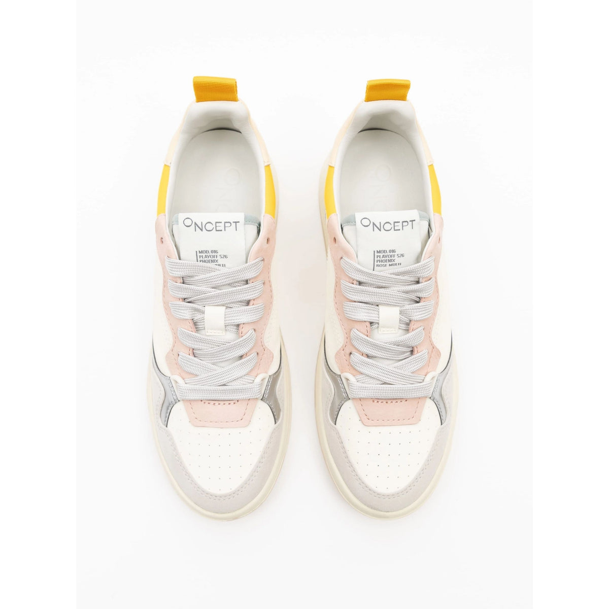 A pair of low-top sneakers shown from a top-down view on a white background. The sneakers feature a white leather upper with light pink panels, gray overlays, gray laces, and bright yellow pull tabs on the tongue.