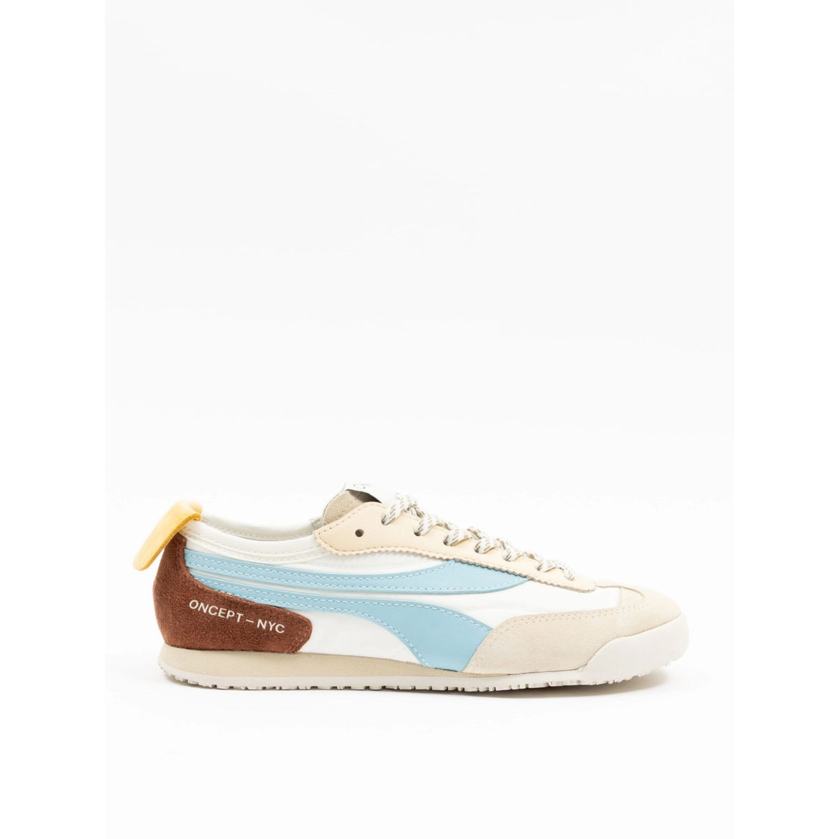 A low-top sneaker from Oncept NYC in a cream, light blue, and brown colorway, shown from the side against a plain white background.