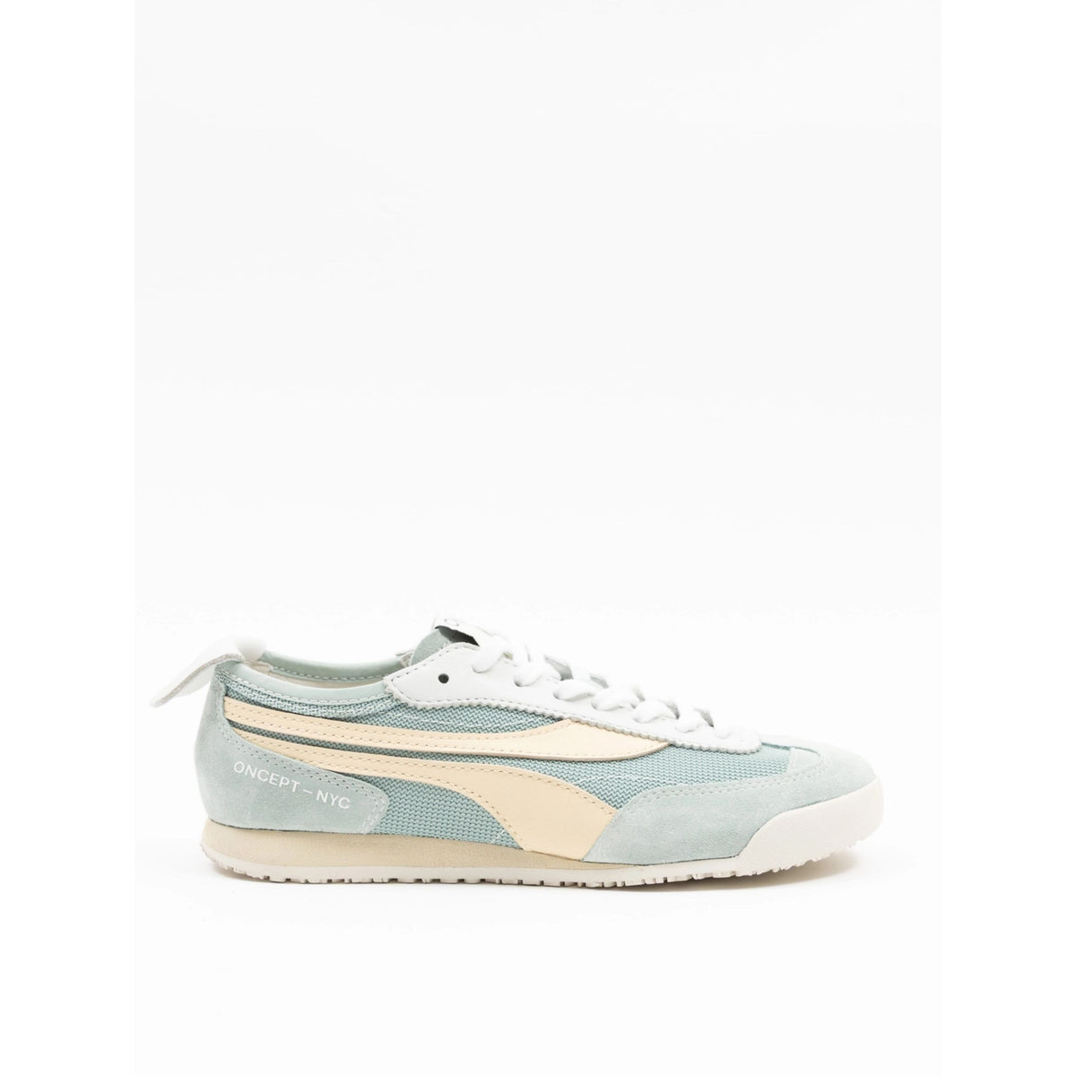 A light blue suede and mesh sneaker with a beige side stripe, white laces, and a cream-colored sole, shown against a plain white background.