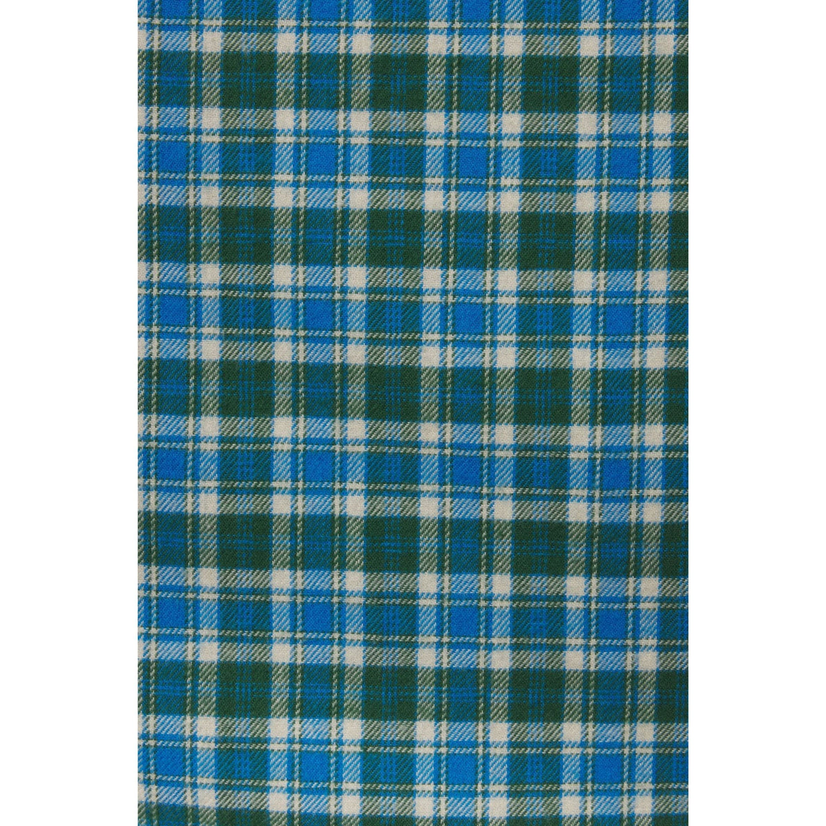 A close-up of a plaid fabric pattern with blue, green, and white stripes in a tartan design.