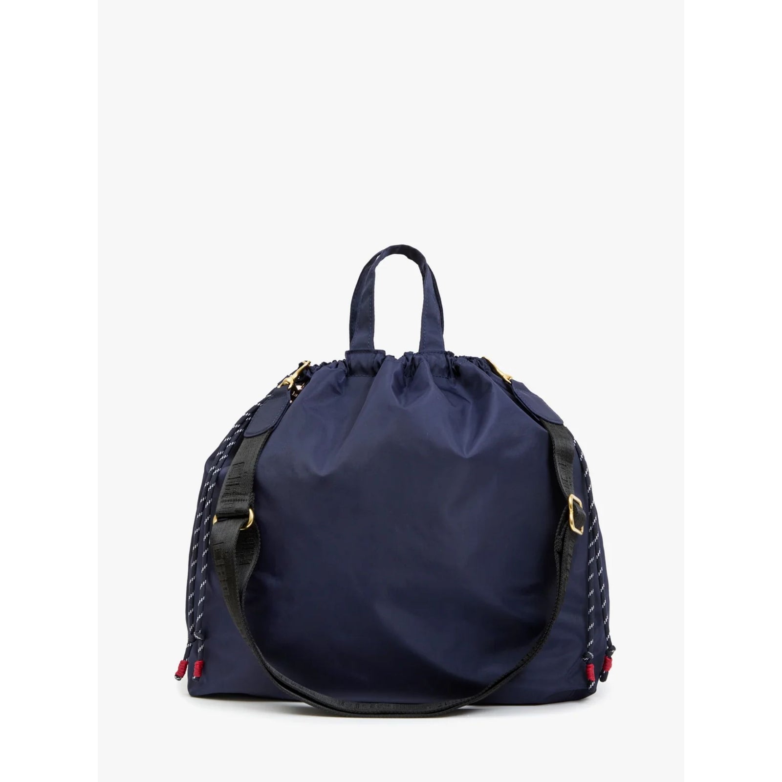 Front view of the "Sac Tout" bag in navy blue nylon with top handles and a black webbing shoulder strap against a plain background.