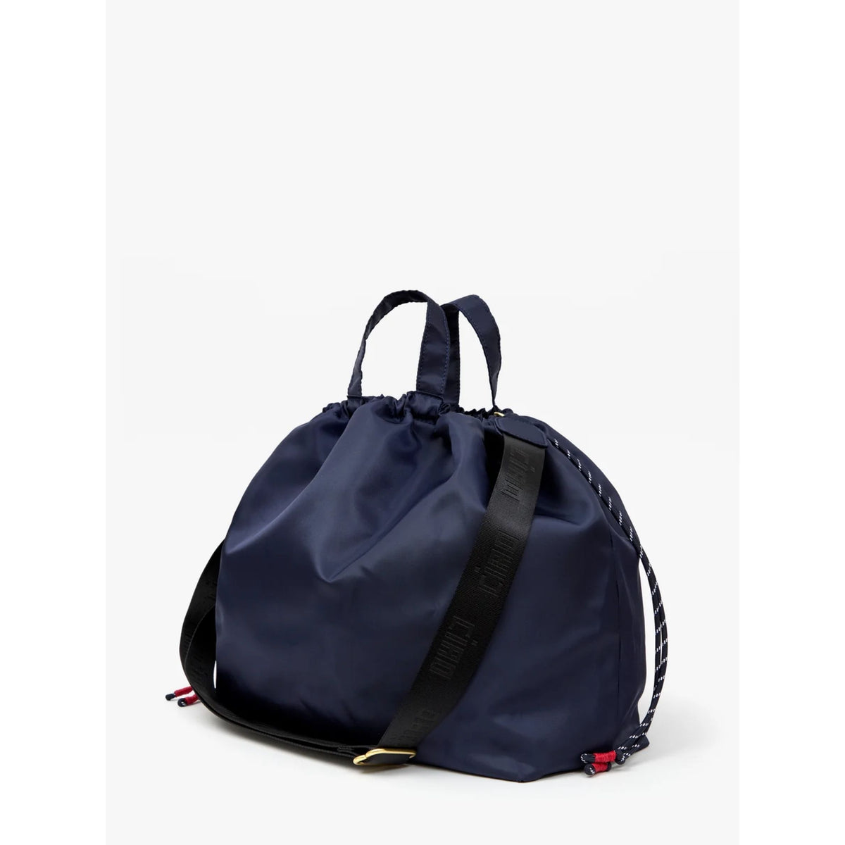 Front view of the navy blue nylon bag with the drawstring cinch top pulled tight.
