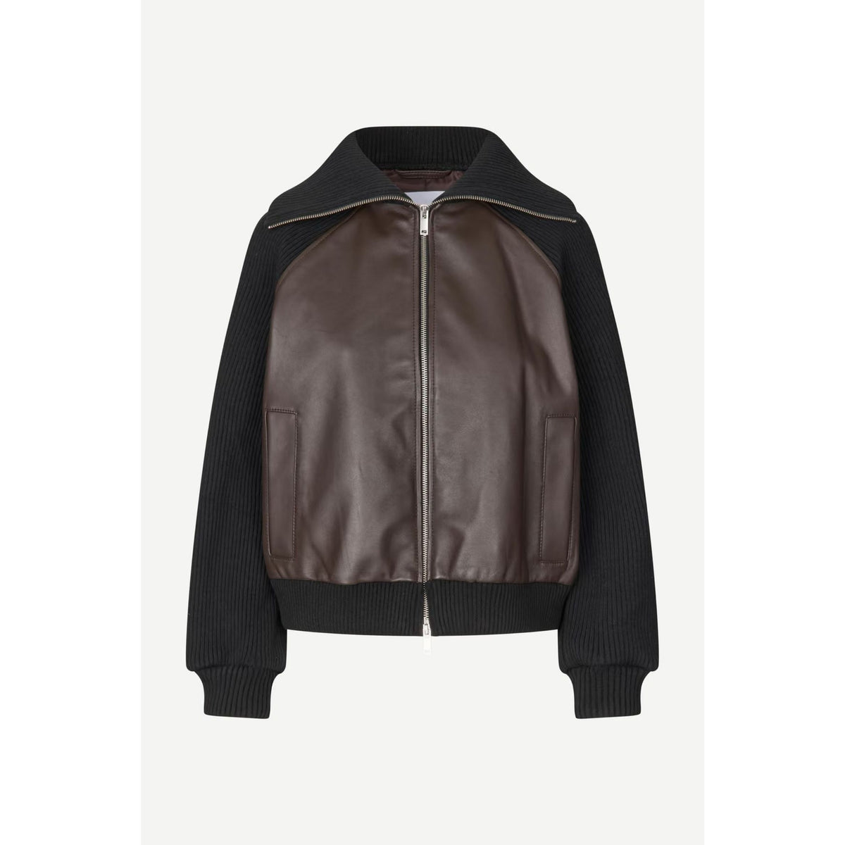 A cropped bomber-style jacket featuring dark brown faux-leather panels on the front and a black ribbed knit body, sleeves, and collar, shown against a light gray background.