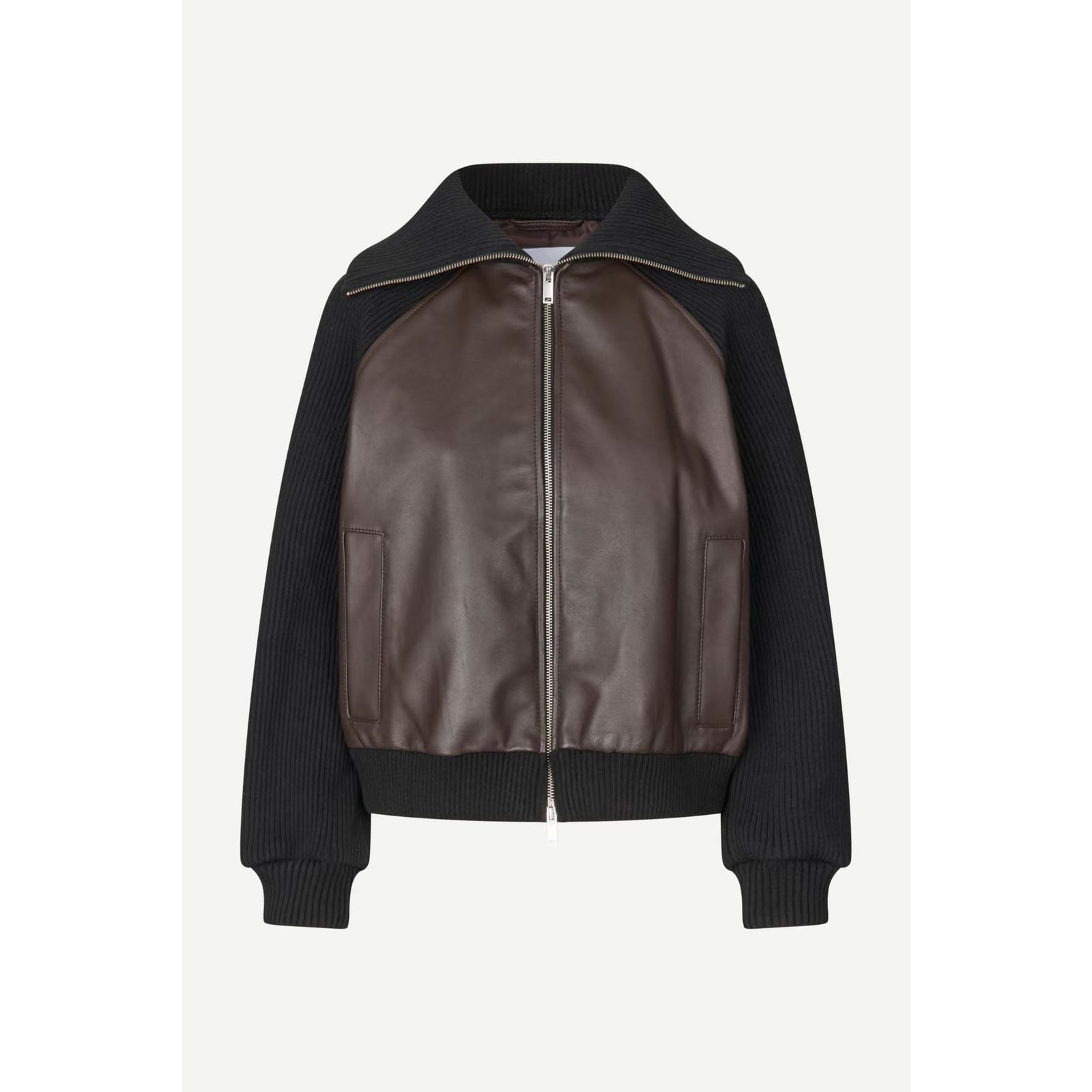 A cropped bomber-style jacket featuring dark brown faux-leather panels on the front and a black ribbed knit body, sleeves, and collar, shown against a light gray background.