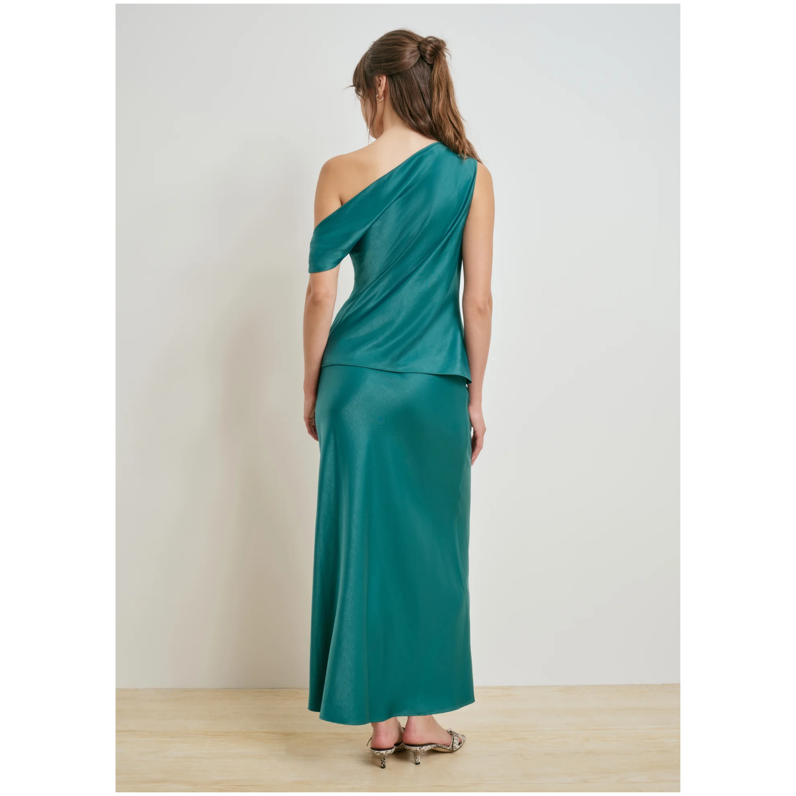 A teal green satin midi skirt with a high waistband, shown against a plain white background.