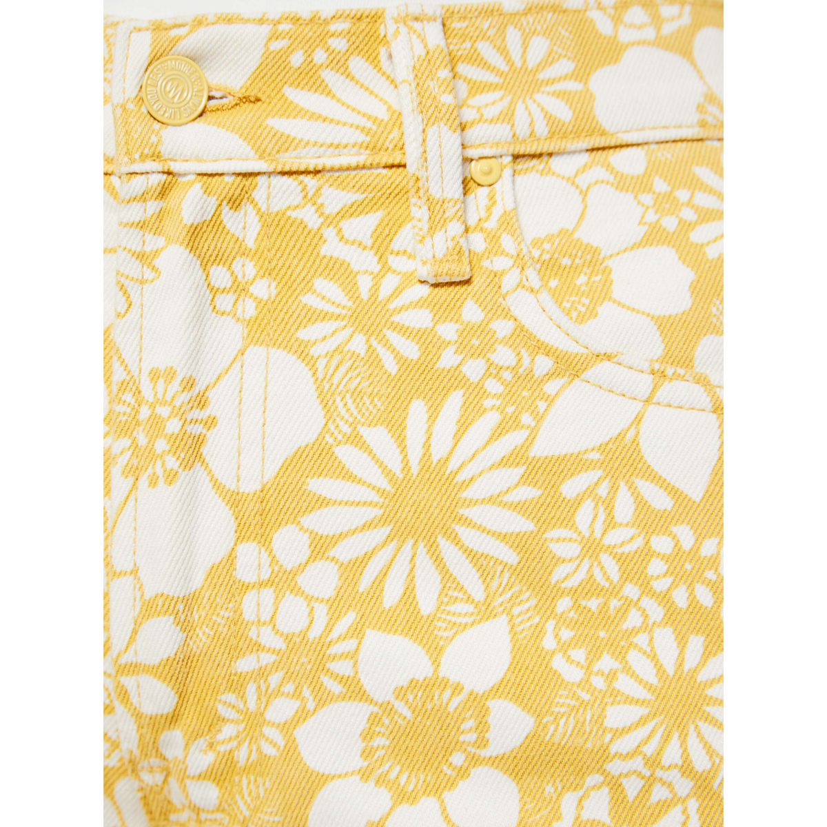 Yellow fabric with white floral pattern on a white background