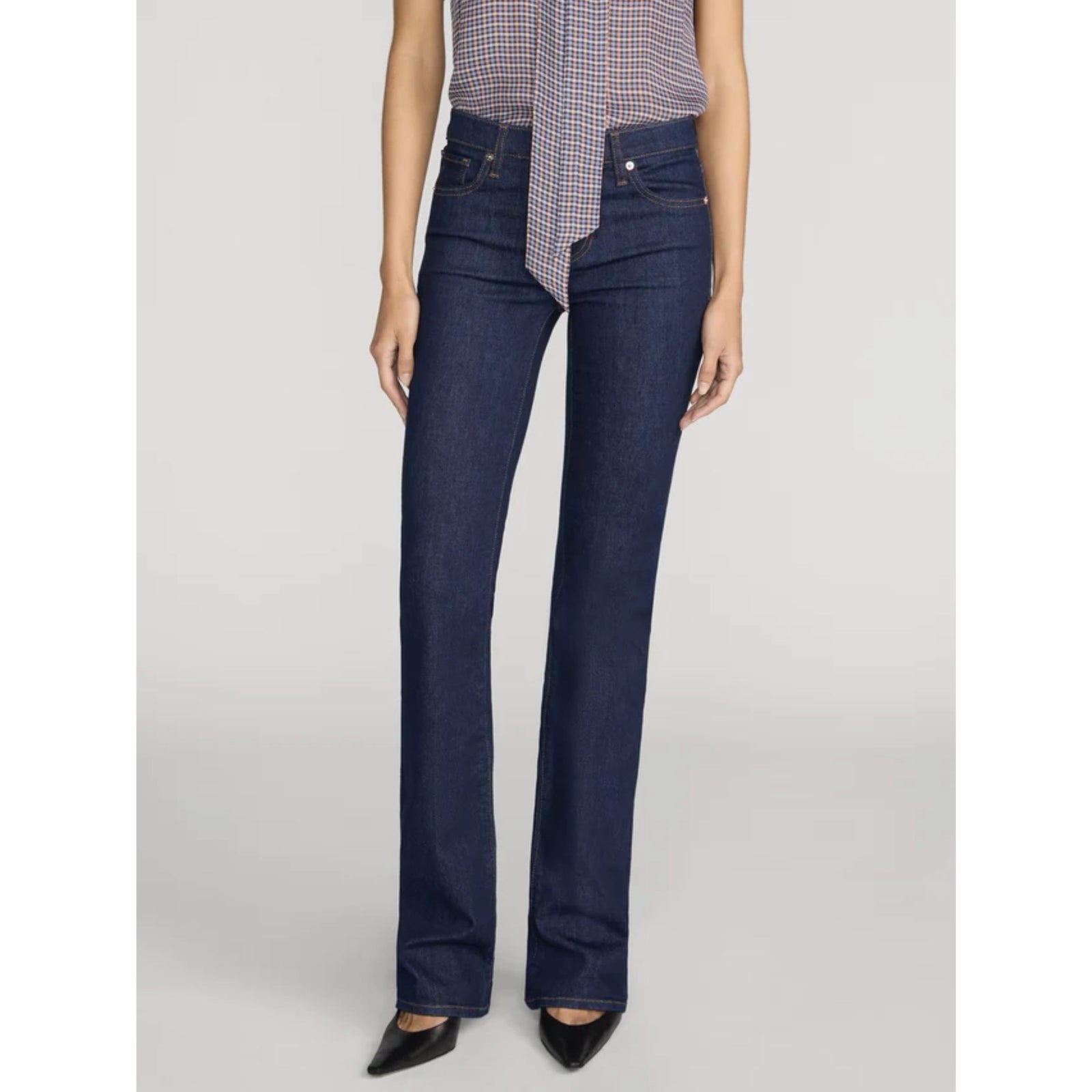 Dark navy blue flare jeans shown flat against a light gray background.