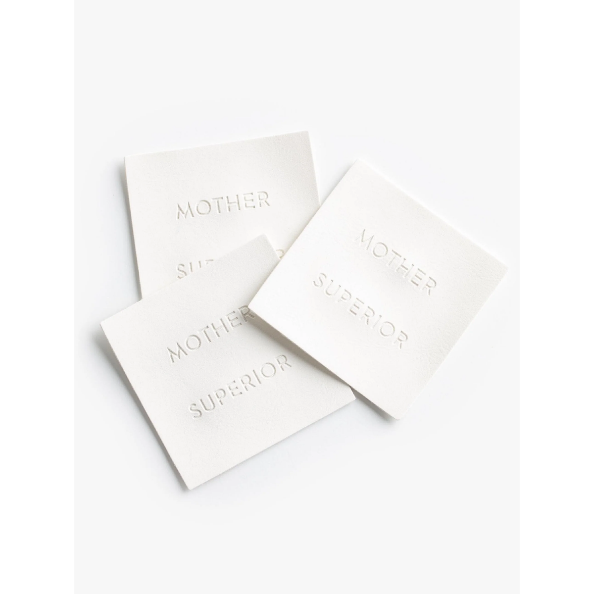 White cards with text on a white background