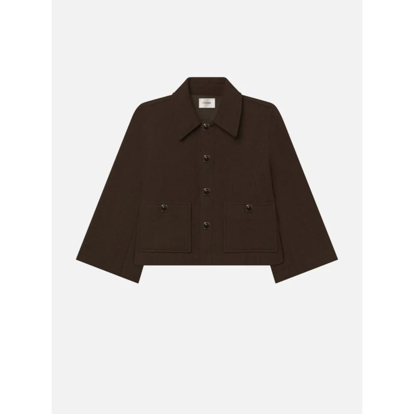 A dark brown cropped jacket with a pointed collar, front button closure, and two front flap pockets, shown flat against a light gray background.