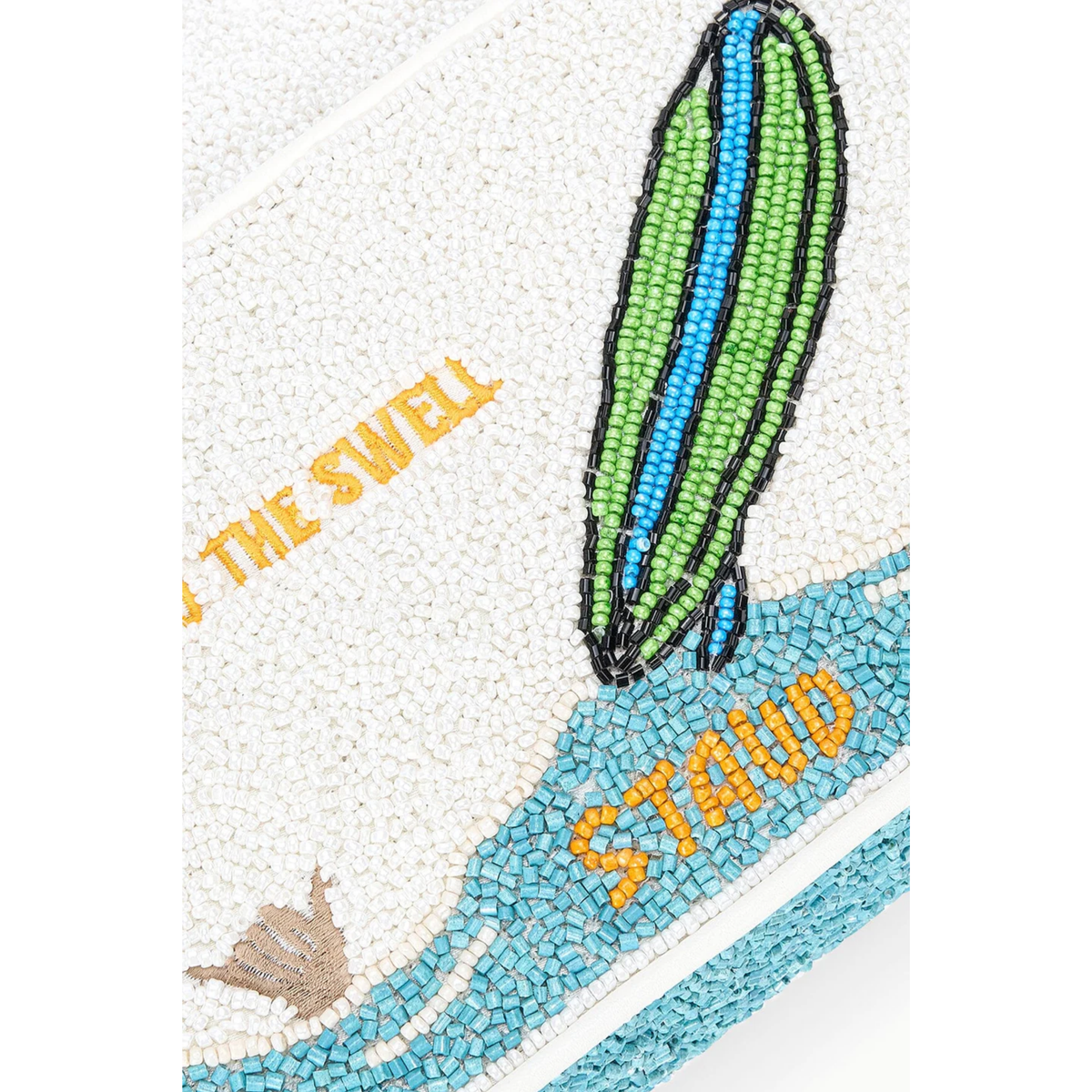 Beaded item with 'The Swell' and 'Staud' branding on a white background