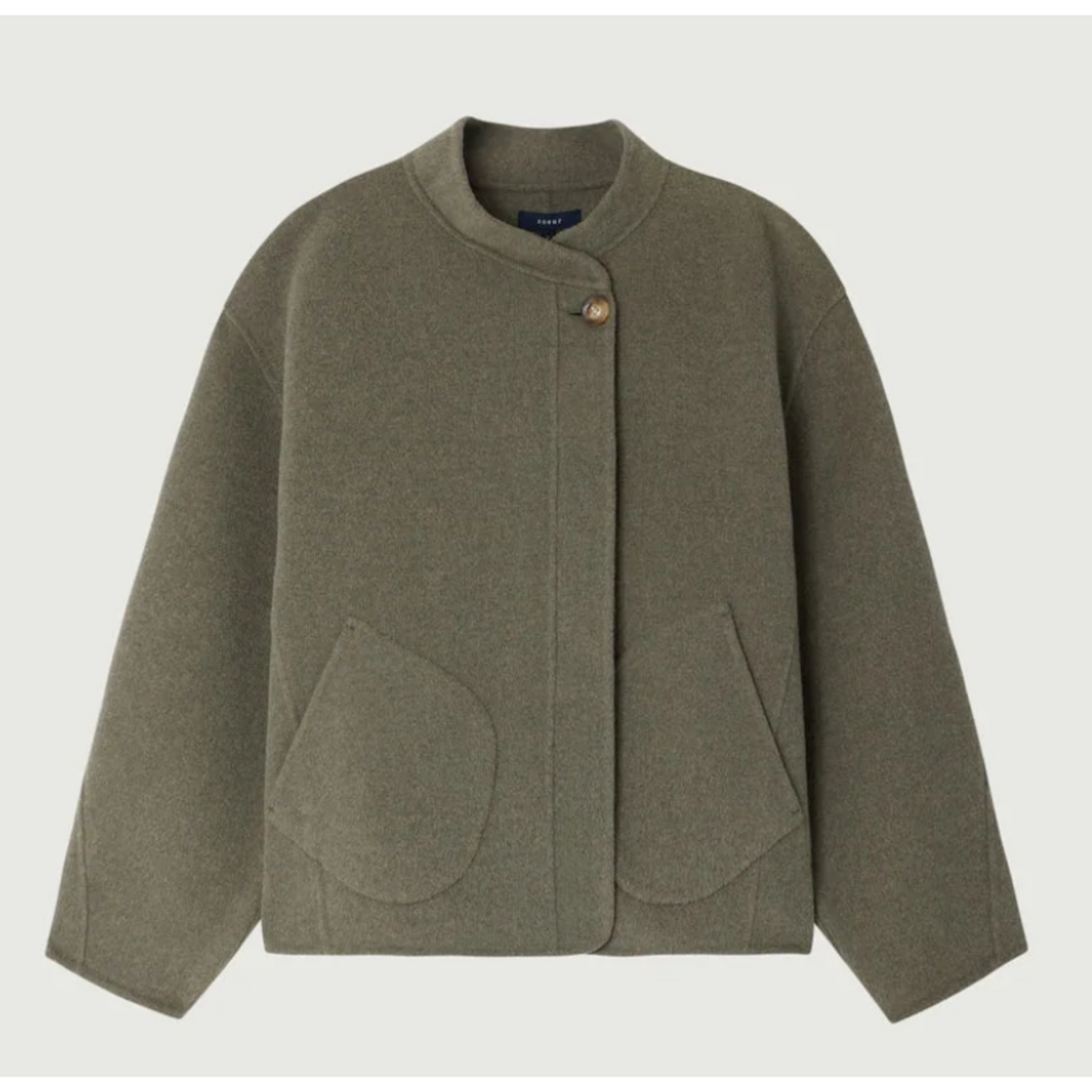 An olive green cropped jacket with a single button closure, a mock neck, and two large front patch pockets, shown against a light gray background.